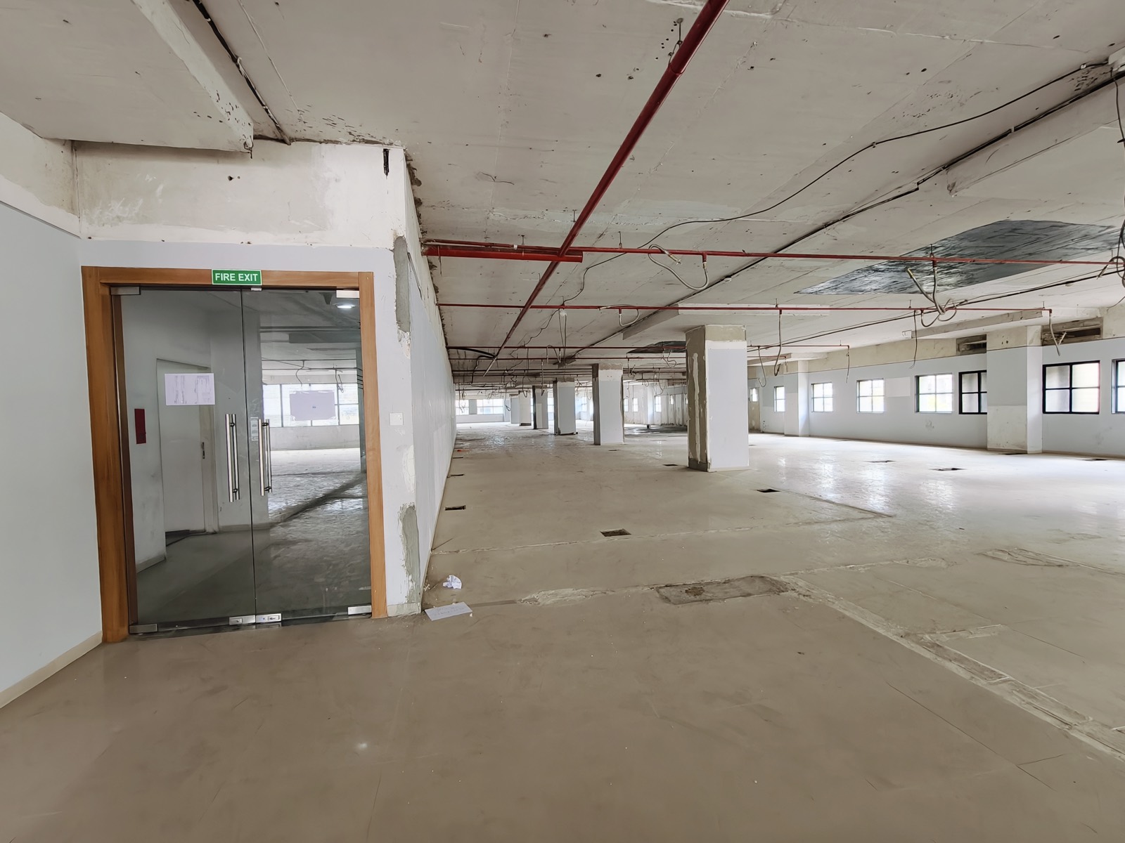 Open floor plate with glass fire-exit door